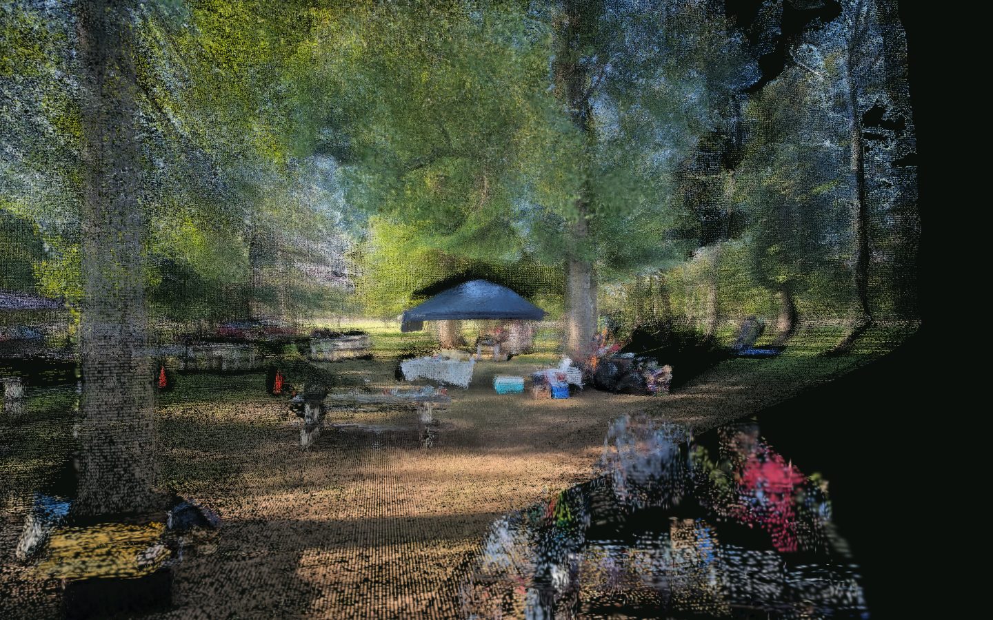 The MMNJ Sports Day ground: a sunlit lawn under tall trees, a dark gazebo in the middle, tables and coolers along the path.