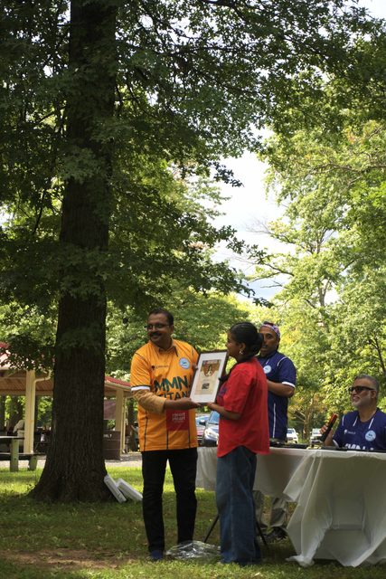 A photo from MMNJ Sports Day, taken at the white table.